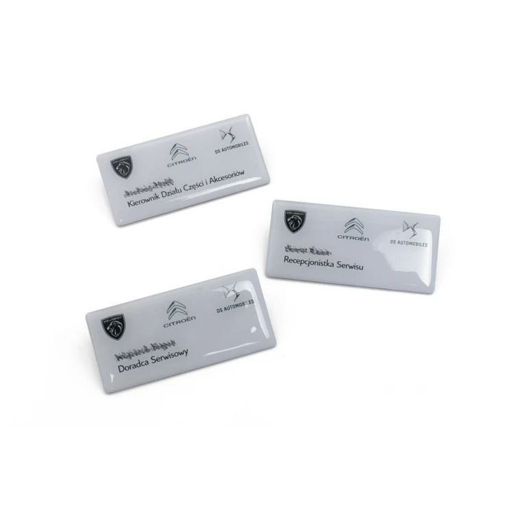 Identyfikator stalowy pokryty żywicą - 80x40mm - ID098 - druk UV i doming