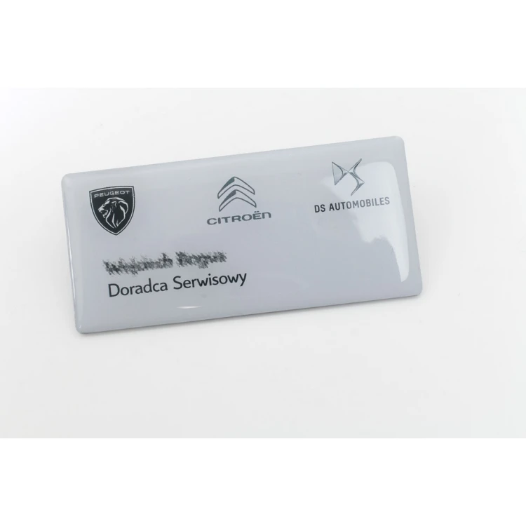 Identyfikator stalowy pokryty żywicą - 80x40mm - ID098 - druk UV i doming